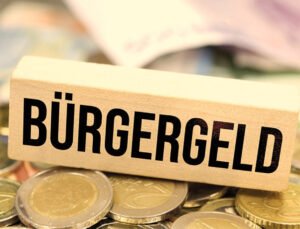 Almanya’da emsal karar: Yurt dışına çıkanın yardımı kesilemez